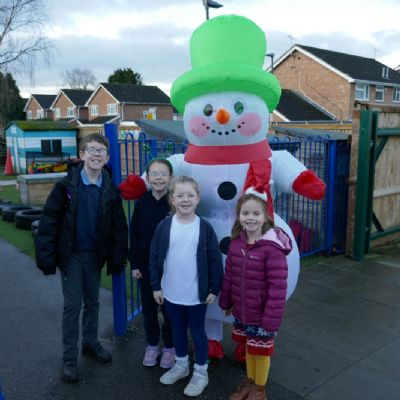 A giant snowman with pupils